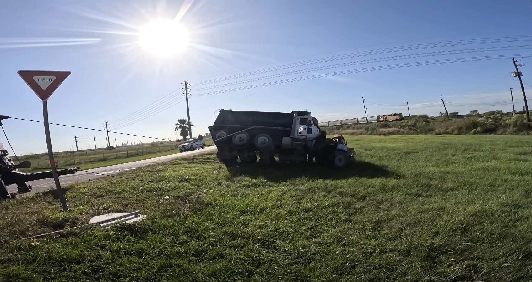 Heavy duty towing service handling a large commercial truck in Babylon, NY